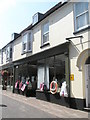 Thoroughfare- items hanging up outside a shop