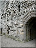 NU2521 : Detail of Dunstanburgh Castle by Humphrey Bolton