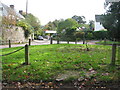 Bench on the triangular green at the centre of Feniton Court