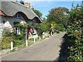 North Street and a thatched cottage