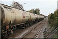 Oil train passing through the station