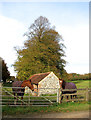 Small flint and brick barn in North Creake