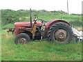 SH2740 : Old Massey Ferguson tractor at Porth Dinllaen Farm by Eirian Evans