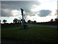 A seat in the middle of a road junction