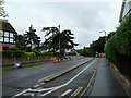 Approaching the junction of Merryfield Drive and Guildford Road