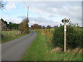 Footpath crosses the lane near Millbank Farm