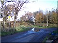 Public footpath sign on Outlet Lane