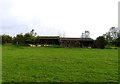 Sheds in a field