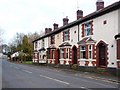 Pebble-dashed houses on Heywood Old Road