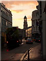 Ryde: bus in Cross Street below a fiery sky