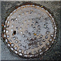 SO9095 : Old manhole cover in Penn, Wolverhampton by Roger  D Kidd