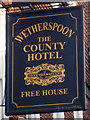 The County Hotel sign