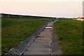 Drainage channel in the sea defence