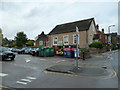 Looking past a car park towards Denne Road Gospel Hall