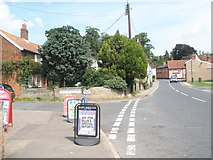 TM2850 : Approaching the junction of The Street and  Saddlemakers Lane by Basher Eyre