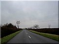 Power lines crossing the road