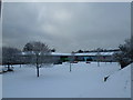 A snowy car park at Home Base