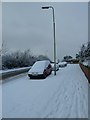 Snow on the pavement in Bedhampton Hill