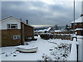 Snowy garden at the junction of Beverley Grove and Portsdown Hill Road