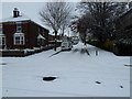 Looking from a snowy Solent Road into Augustine Road