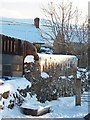 Icicles hanging from a shed roof