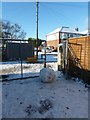 A snowy exit from East Lodge Playing Field