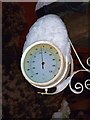 Temperature gauge sporting white busby