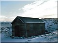 NH7405 : Estate hut at Bad Each by John Ferguson