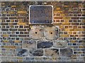 Relics of the Surrey Iron Railway, built into the wall of the Ram Brewery, Wandsworth