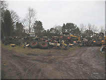 SJ8759 : Tractors graveyard (3) by Stephen Craven