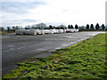 TM1488 : Tibenham airfield (Norfolk Gliding Club) - derigged gliders in their trailers by Evelyn Simak