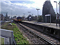 TQ2267 : Train at Motspur Park station by David Howard