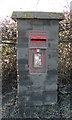 Postbox beside a busy (and dirty) road