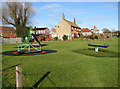 Cottages by the village green in Stokesby