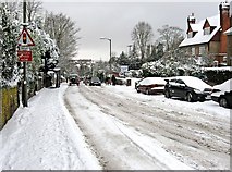 TQ0049 : Snow in Epsom Road (A246) by L S Wilson