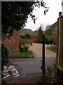 Footpath reaches road in Lower Froyle