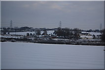 SP9122 : The Grove Lock seen across the snowy fields by N Chadwick