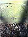 Benchmark on roadside wall pier of almshouses, Norfolk Road