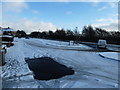 Junction of a snowy Auriol Drive and Havant Road