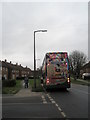 SU8604 : Bus stopping just past the junction of Cherry Orchard Road and Kingsham Avenue by Basher Eyre