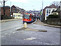 Supertram 104 passes Minto Road Dental Care on Middlewood Road