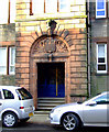 Door with datestone and carved keystone