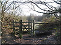 Kissing gate at the northwest corner of Padmall Wood