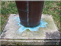 Verdigris staining on the sculpture plinth