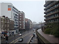 Looking north up Aldersgate Street from the bridge connecting the Barbican with Barbican station