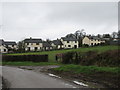 Houses backing on a field in Wembworthy