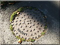 Manhole cover outside the Old Mill, Baginton