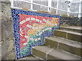 NO4531 : Mosaic on a railway footbridge by James Allan