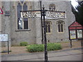 Old fingerposts in front of the church, Chertsey