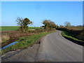 Road scene east of entrance to Parham Lane